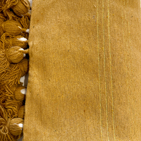 Plaids pompons